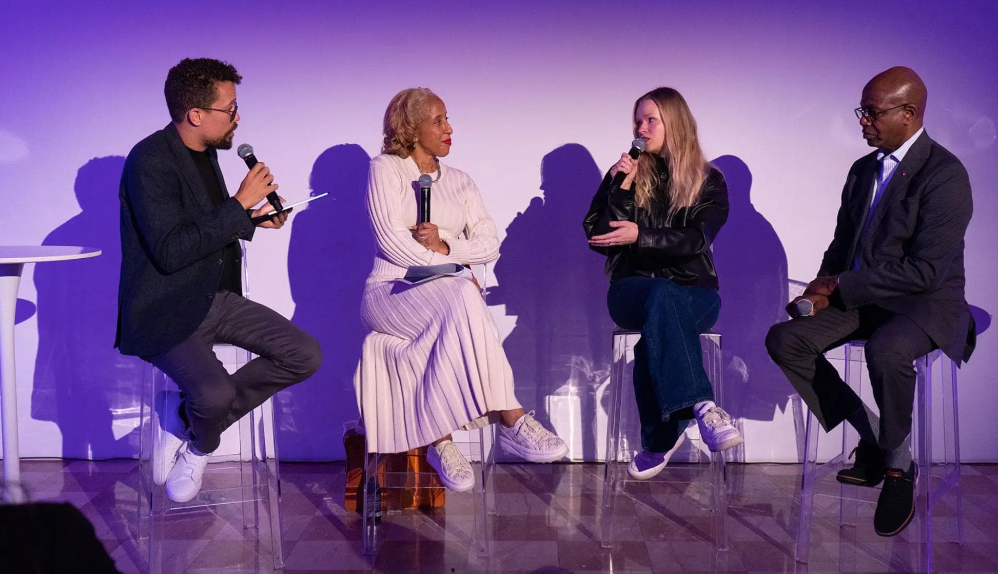 Sára Nožková of Flox, Ricky Smith of Hartsfield-Jackson Atlanta, Justina Mann, former DFW vice president, and moderator Spencer Horne on stage at the AI on the tarmac panel, Evolve 2026 in Miami